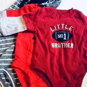 3 baby onesies